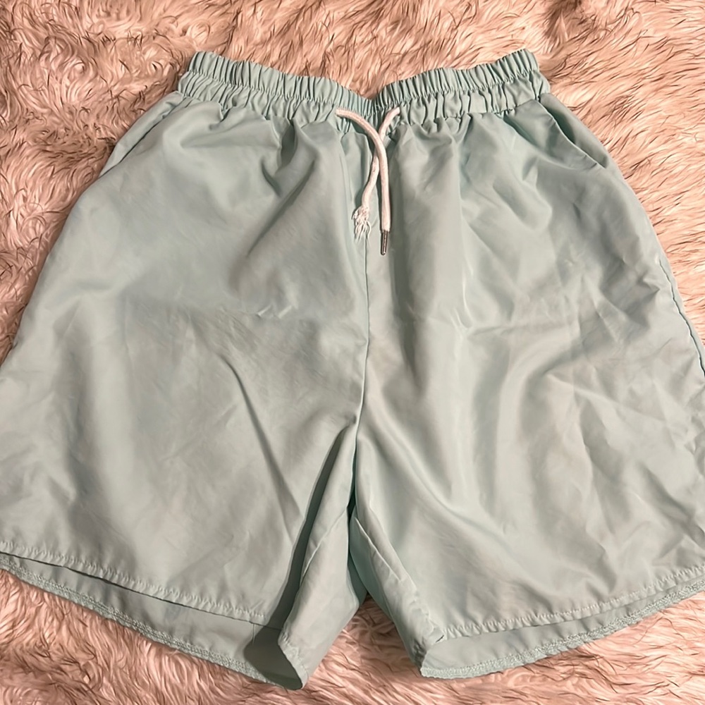 Rumwe Men’s medium swim trunks